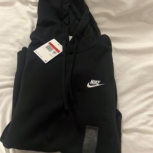 Never worn black Large Nike hoodie for men and women.New with price tags